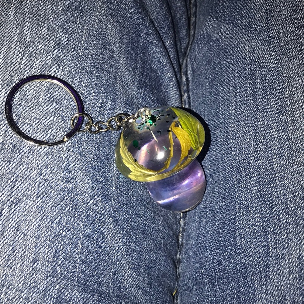 Custom epoxy mushroom 🍄 keychain with my favorite leaves glitter and wish